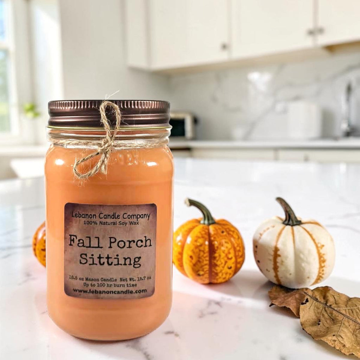 Fall Porch Sitting soy wax candle in amber glass jar with fall leaf accents