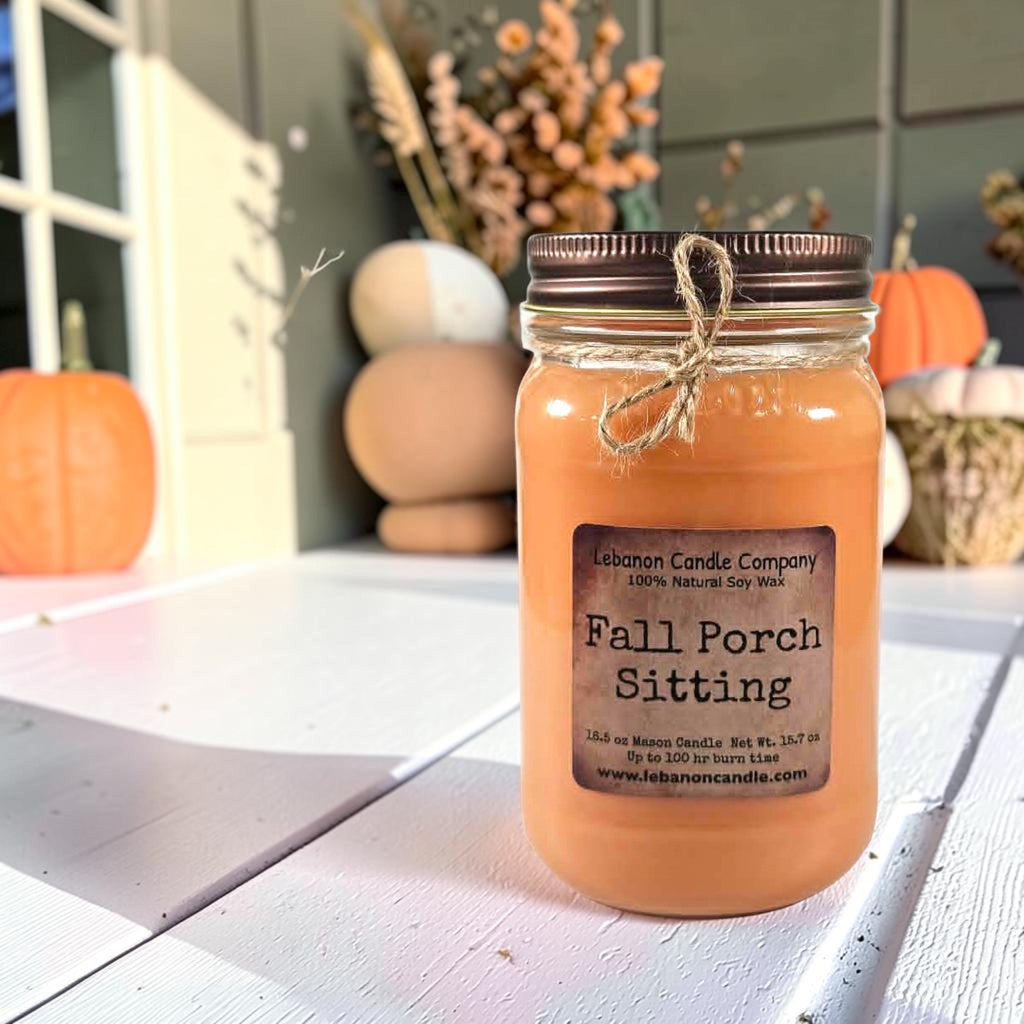 Fall Porch Sitting soy wax candle in amber jar, front label facing forward