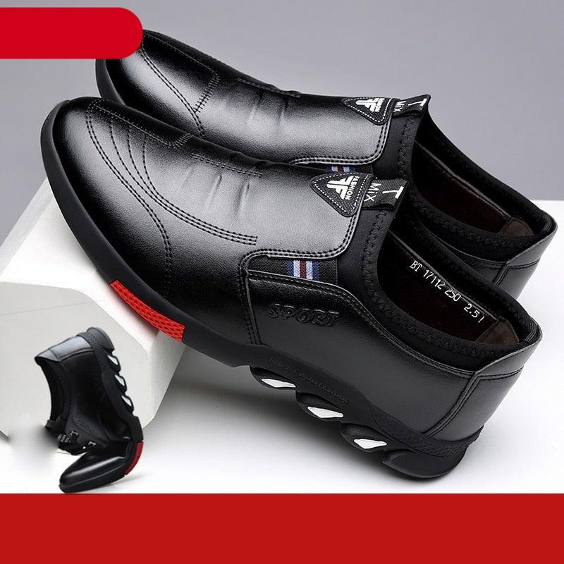 Black leather slip-on sneakers with stitched panels and cushioned non-slip outsole
