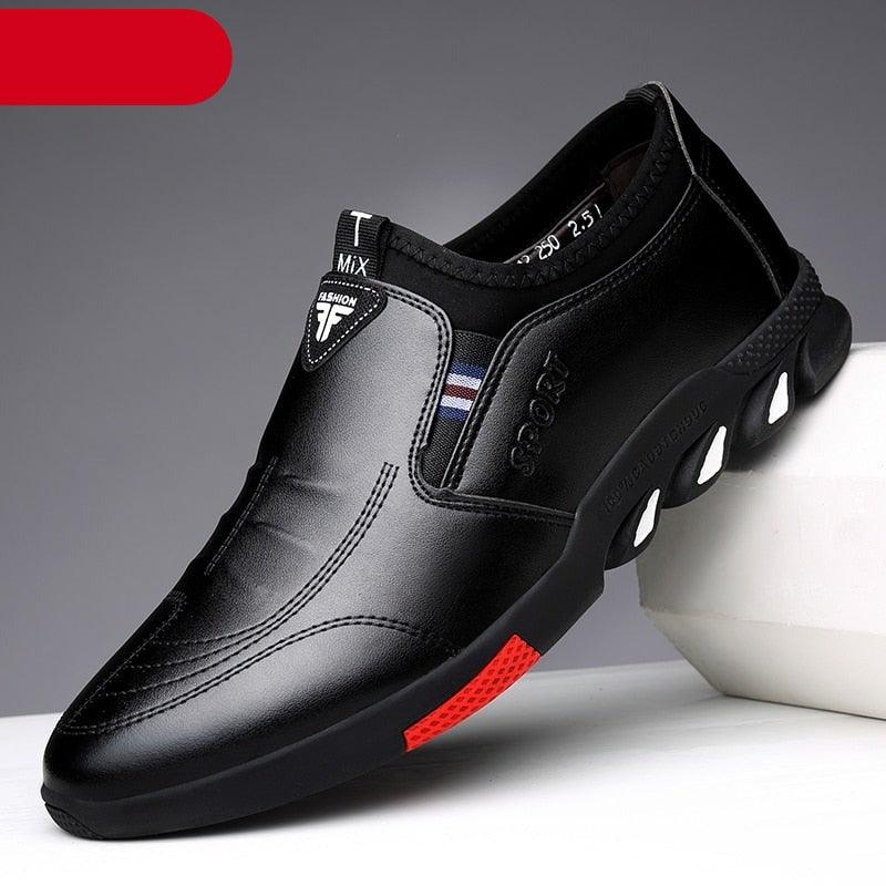 Black leather slip-on casual sneakers with padded collar and textured non-slip outsole