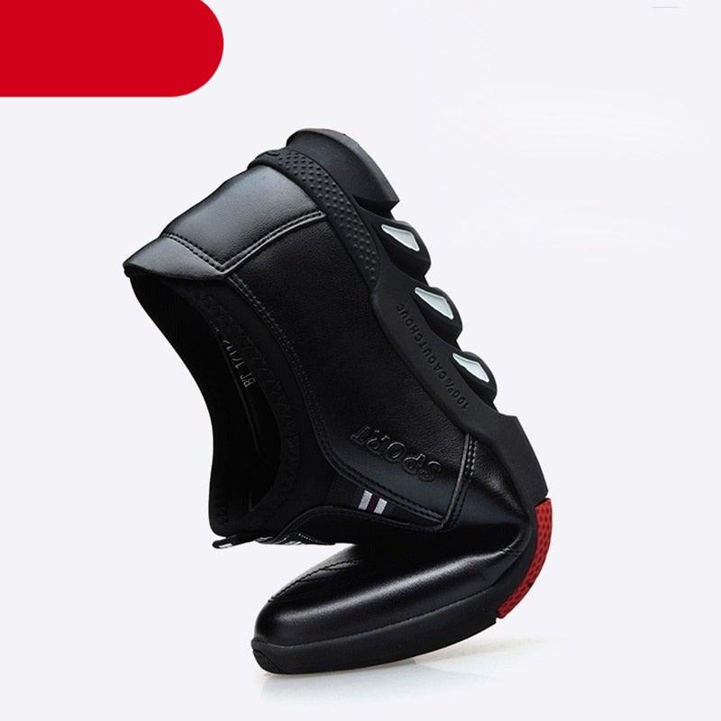 Black leather slip-on sneakers with padded collar and textured rubber grip sole