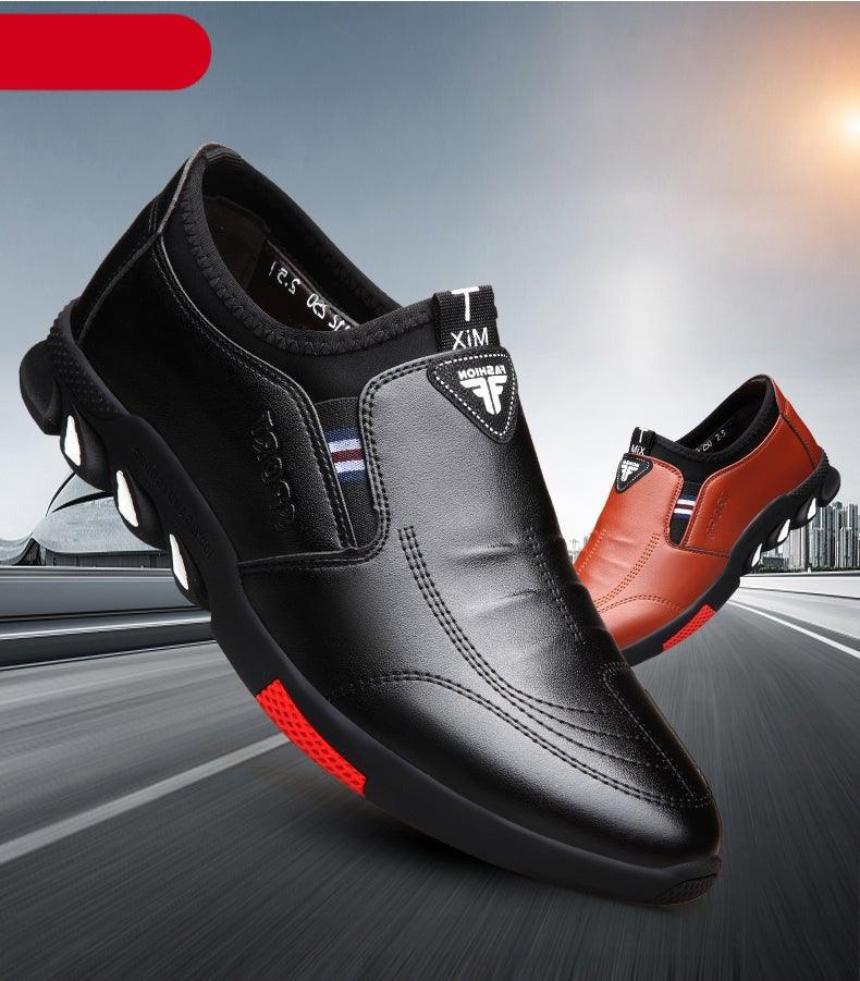 Black leather slip-on sneakers with stitched panels and textured rubber grip outsole