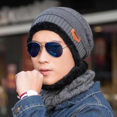 Men's gray knit beanie with black hooded neck warmer and leather patch