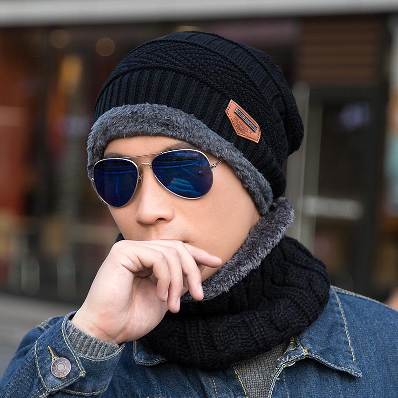 Black knitted beanie with faux-fur lining and matching black knit neck warmer set