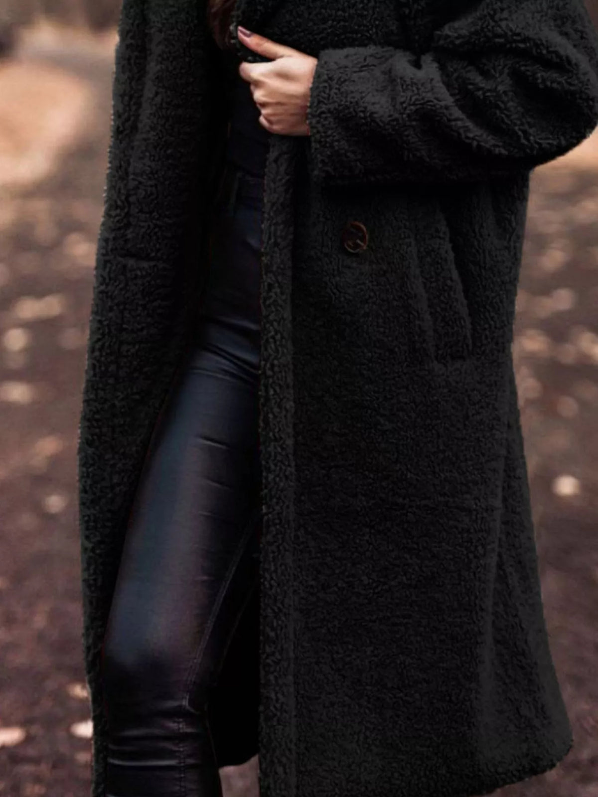 Black hooded longline teddy coat with button front and long sleeves