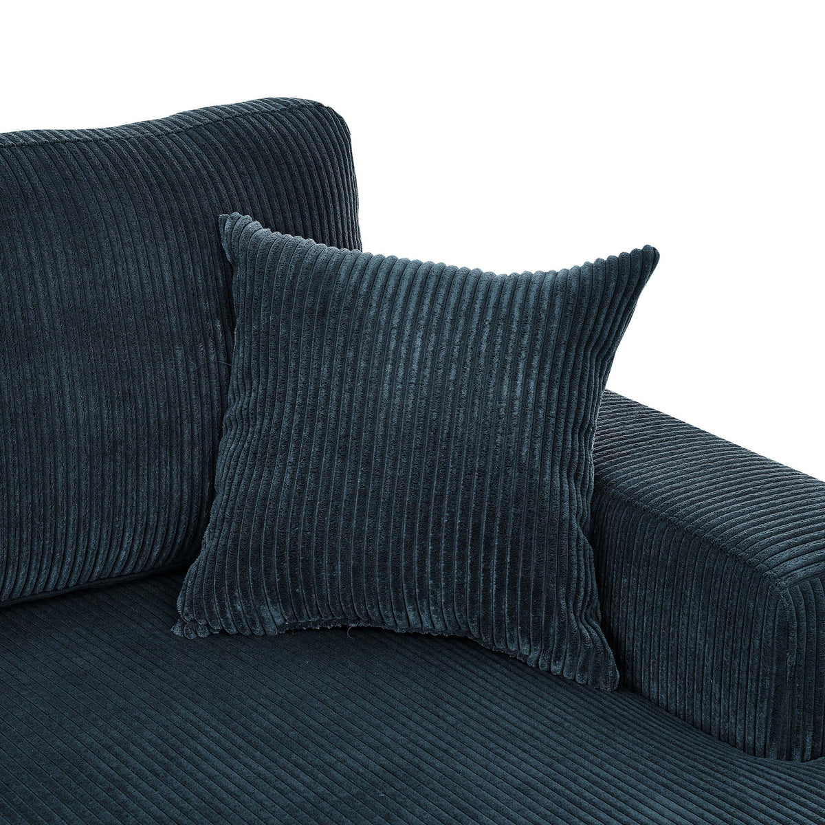 Dark blue sectional sofa with corduroy-style upholstery and throw pillow