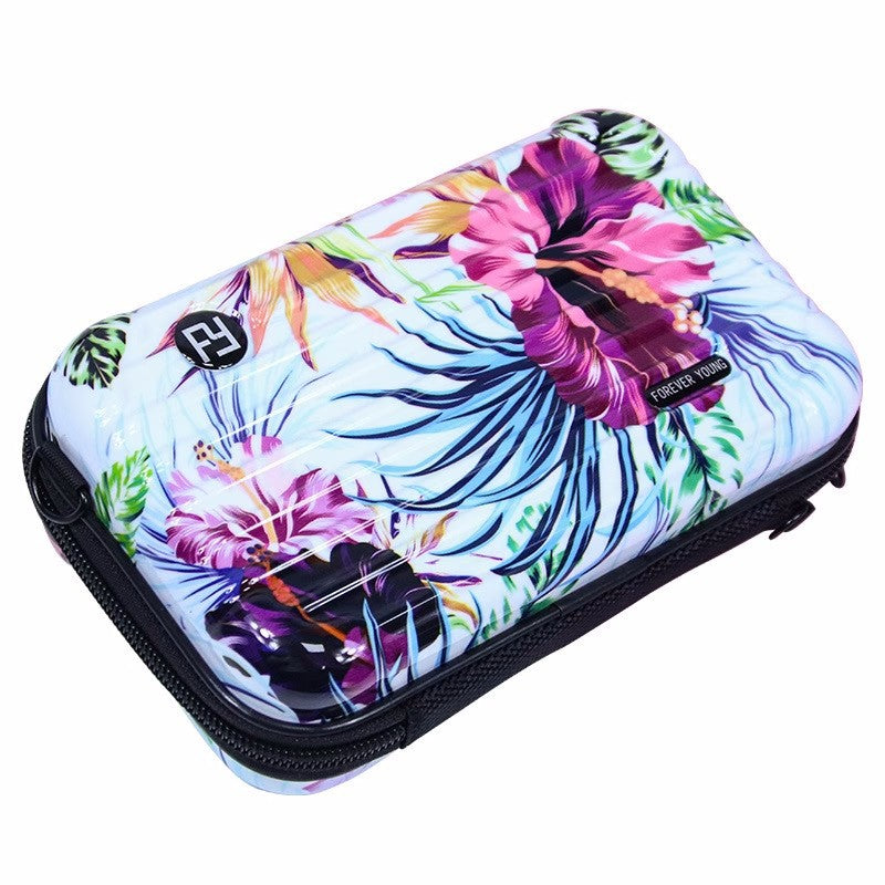 Cosmetic bag with tropical flower print on white, black zipper and trim