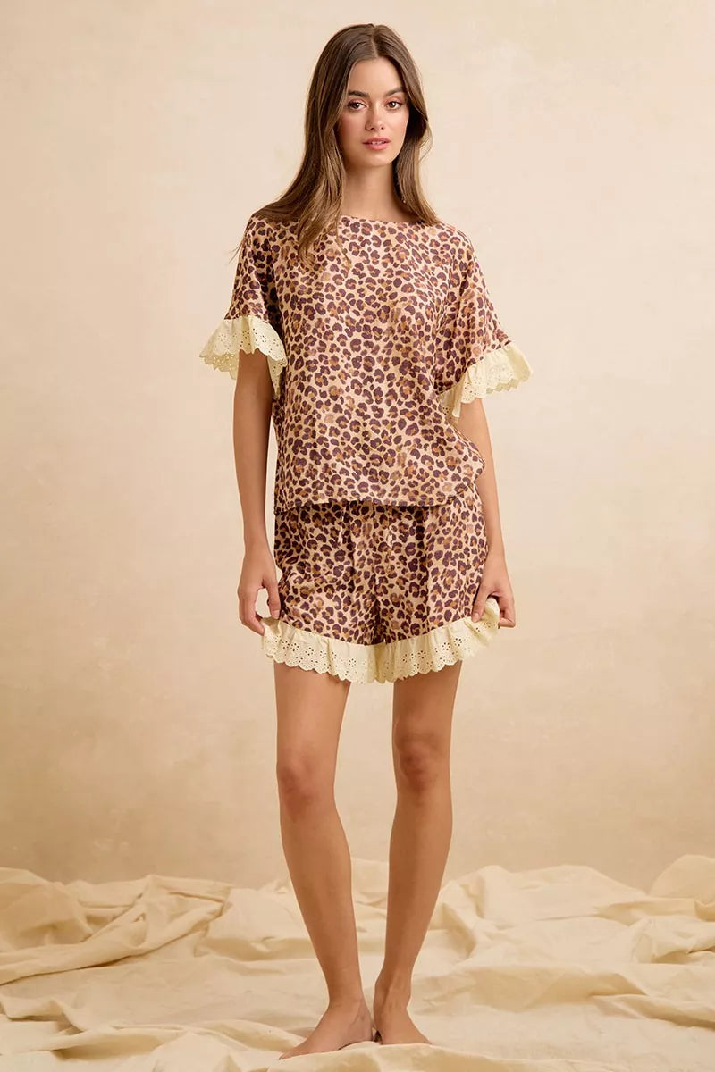 Leopard print ruffle top and shorts set with eyelet lace cuffs and scalloped edges