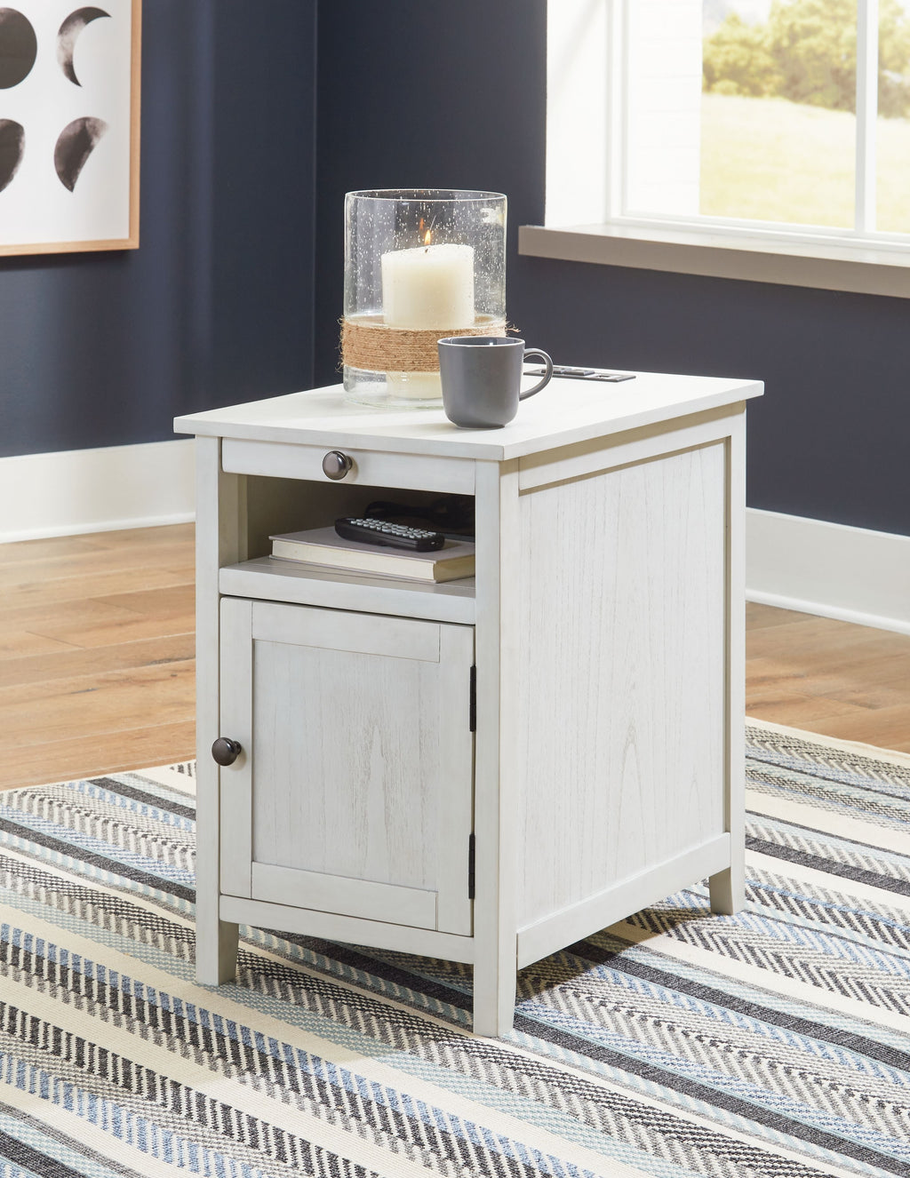 White chairside end table with cabinet door, drawer, and round metal pulls