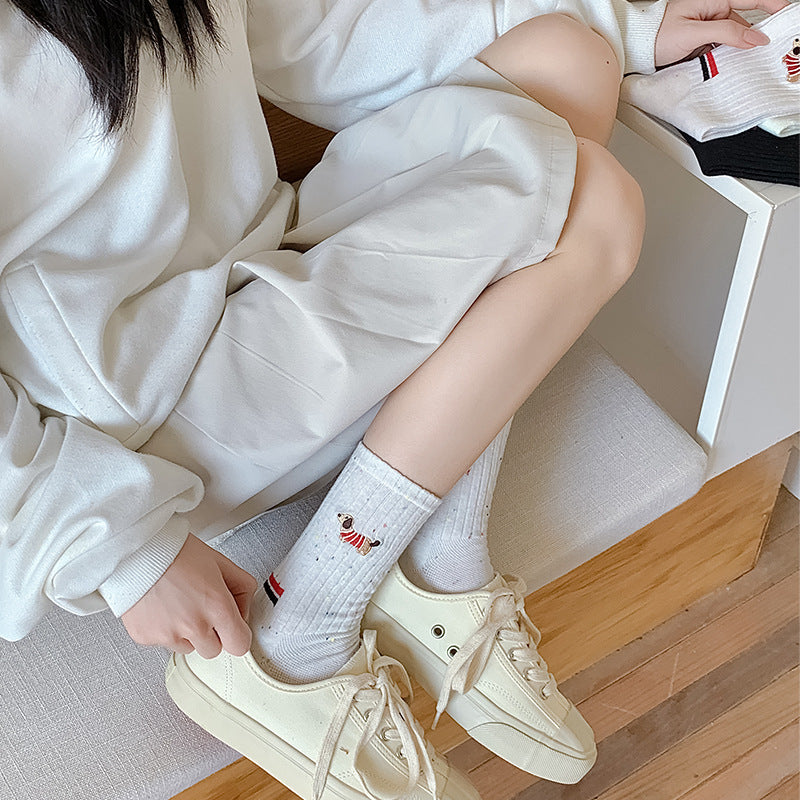 Children's light gray ribbed socks with small dog embroidery and red/blue stripe cuff