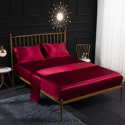 Satin bedding set with deep red sheet and matching pillowcases, 4-piece set