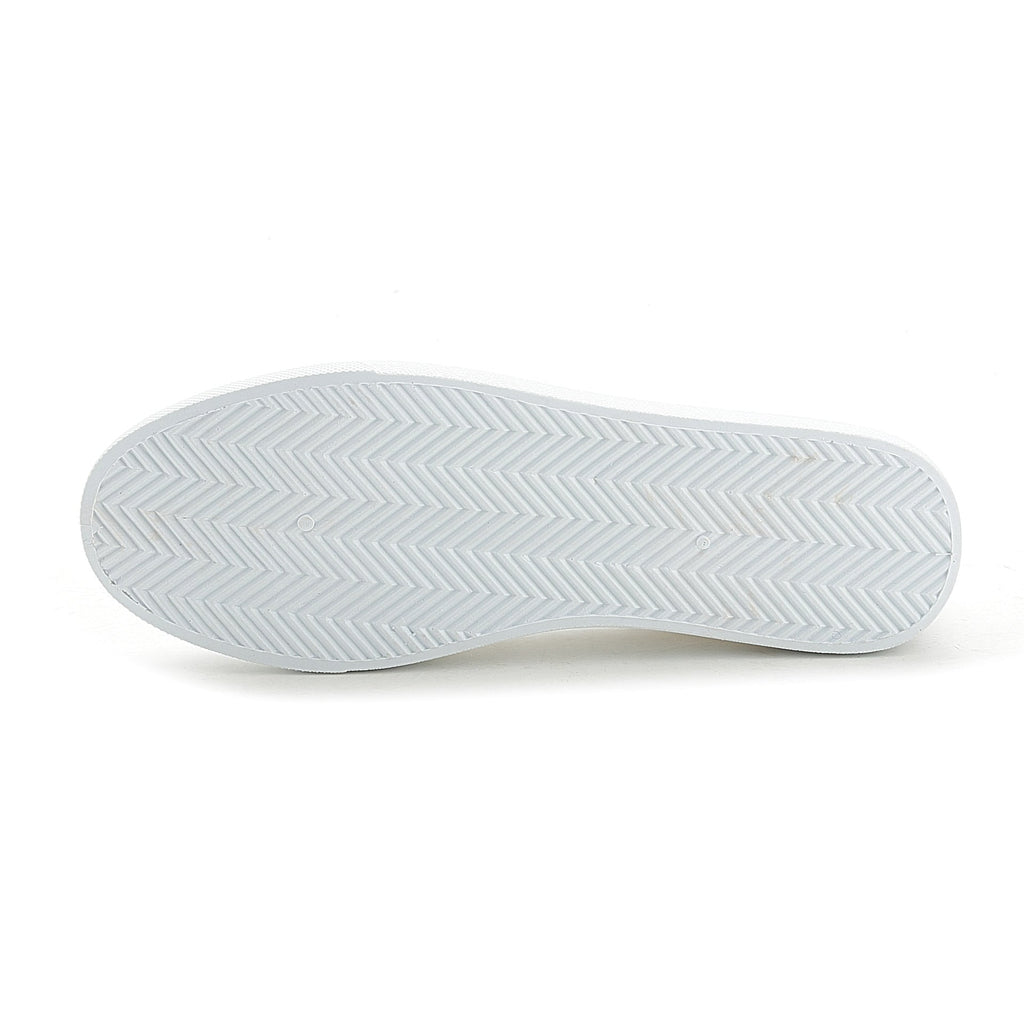 White rubber outsole with herringbone tread pattern