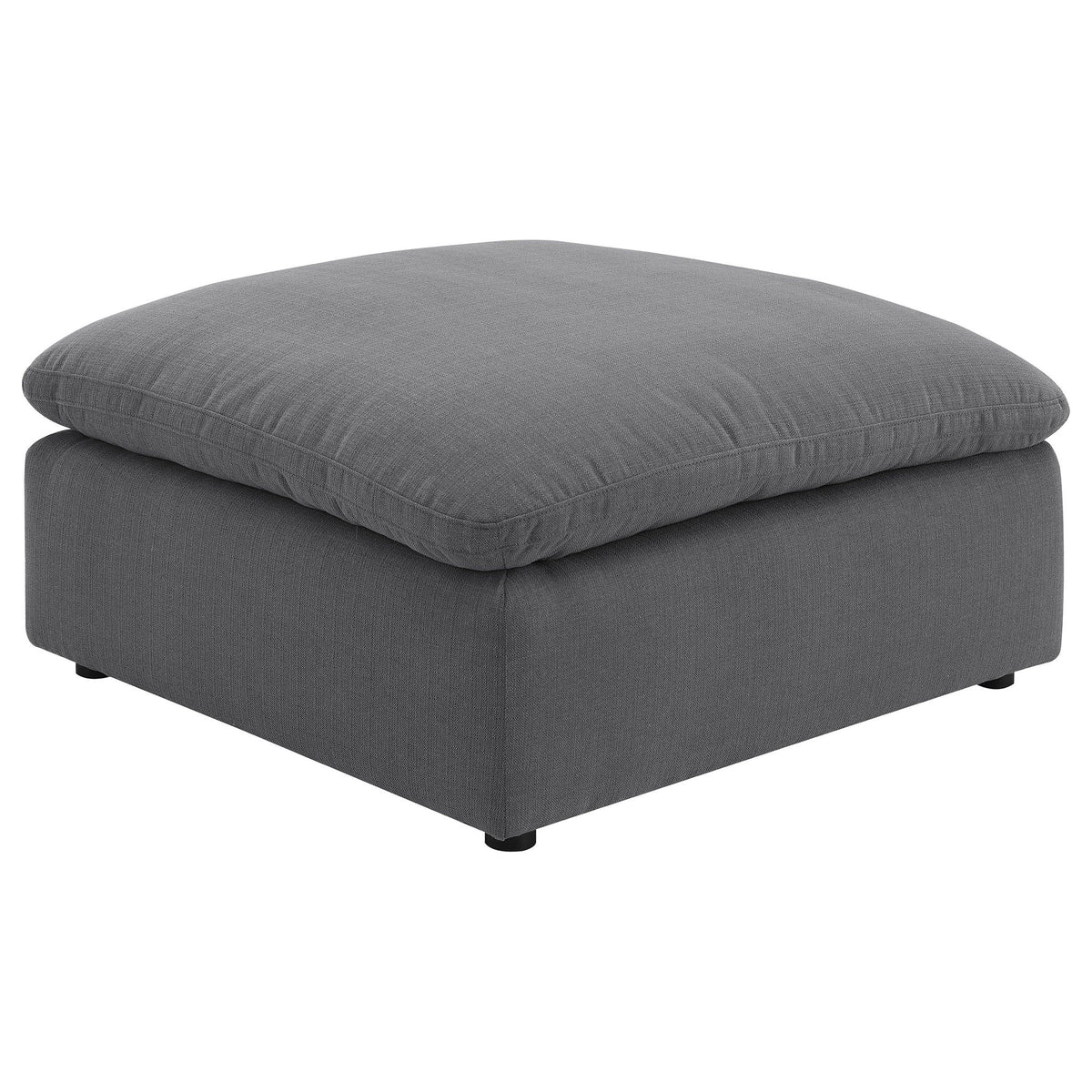 Charcoal upholstered ottoman with padded top cushion and tapered legs