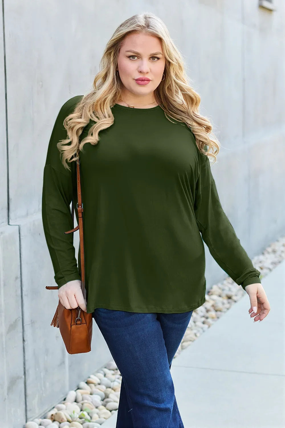 Army green relaxed long-sleeve tee, loose fit with crew neck and curved hem