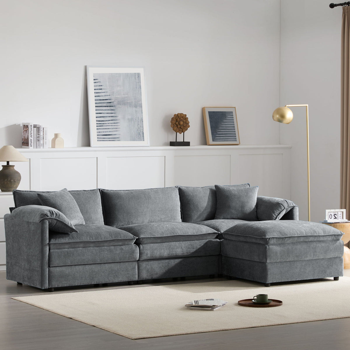 Dark gray 3-seat sectional sofa with corner chaise ottoman and plush cushions