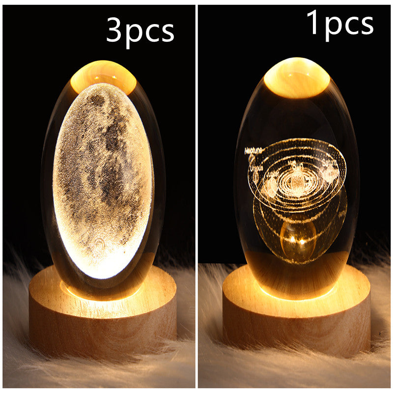 LED galaxy crystal ball table lamp with glowing galaxy swirl and ring circles