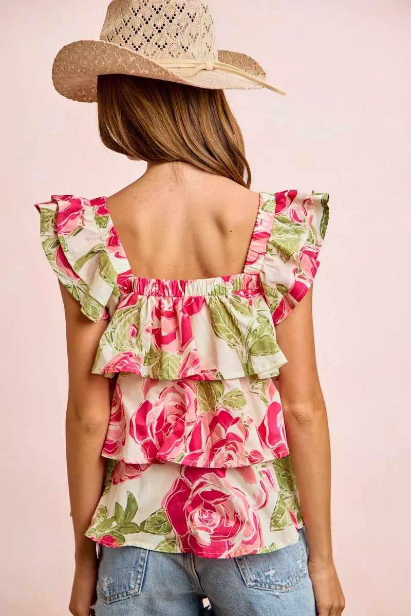 Back view of floral print ruffle square-neck top with layered ruffled tiers