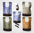 Herbal tea and bath support bundle with pouches and a dark glass healing oil bottle