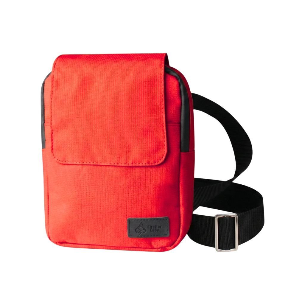 Red ripstop messenger bag with flap front, adjustable shoulder strap, and front label patch.