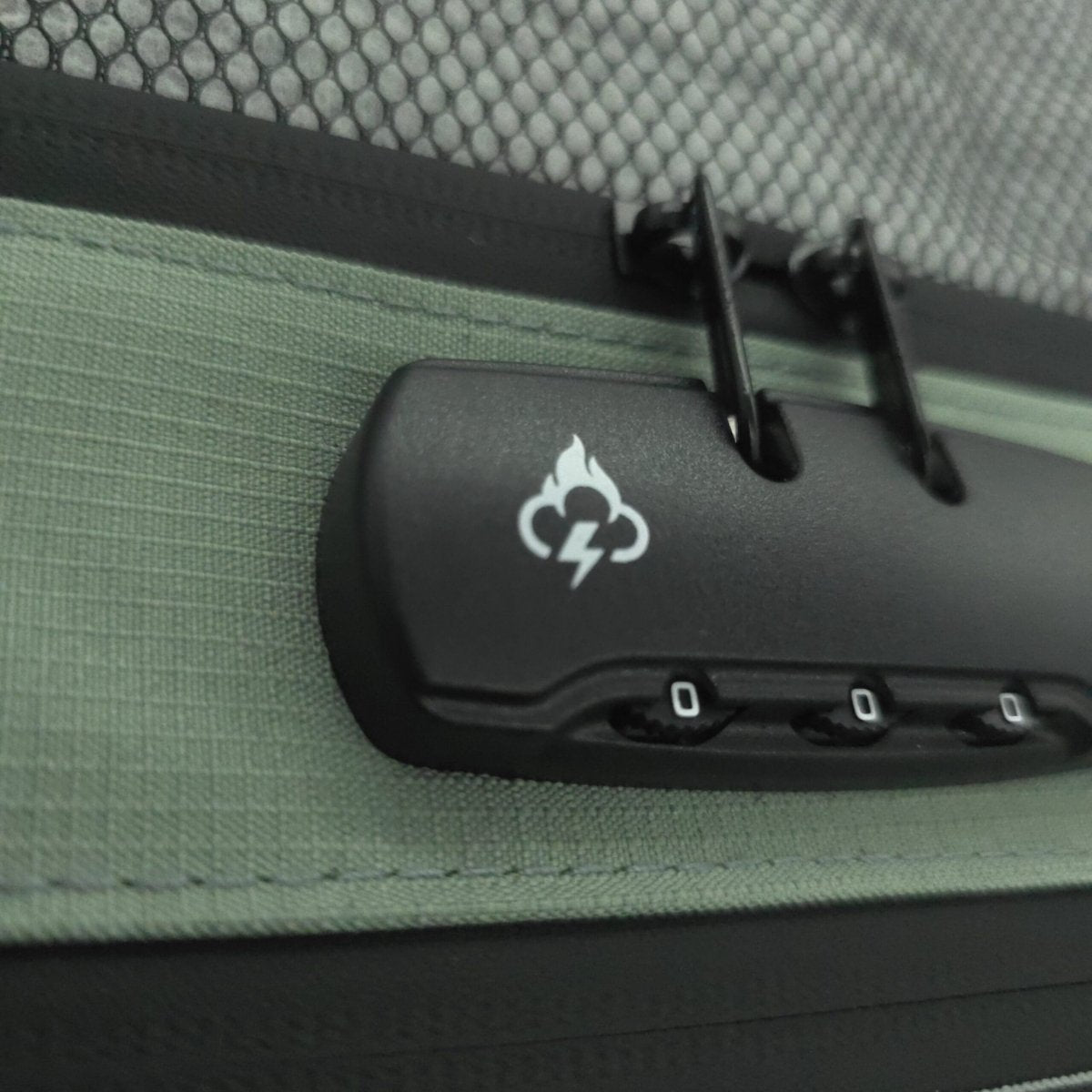 Smell proof travel wallet close-up showing black lock device inside olive fabric