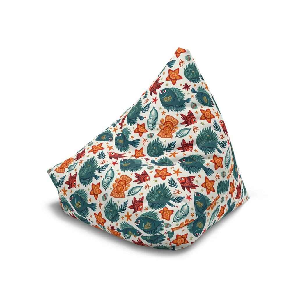 Bean bag chair cover in white with repeating fish, flowers, and leaf pattern, tilted pose