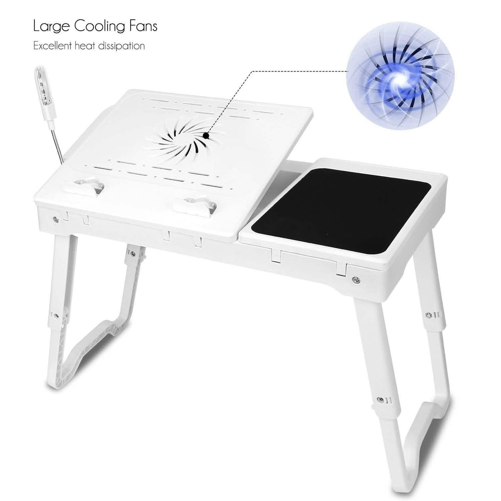 White foldable laptop table with black mouse pad and cooling fan vent