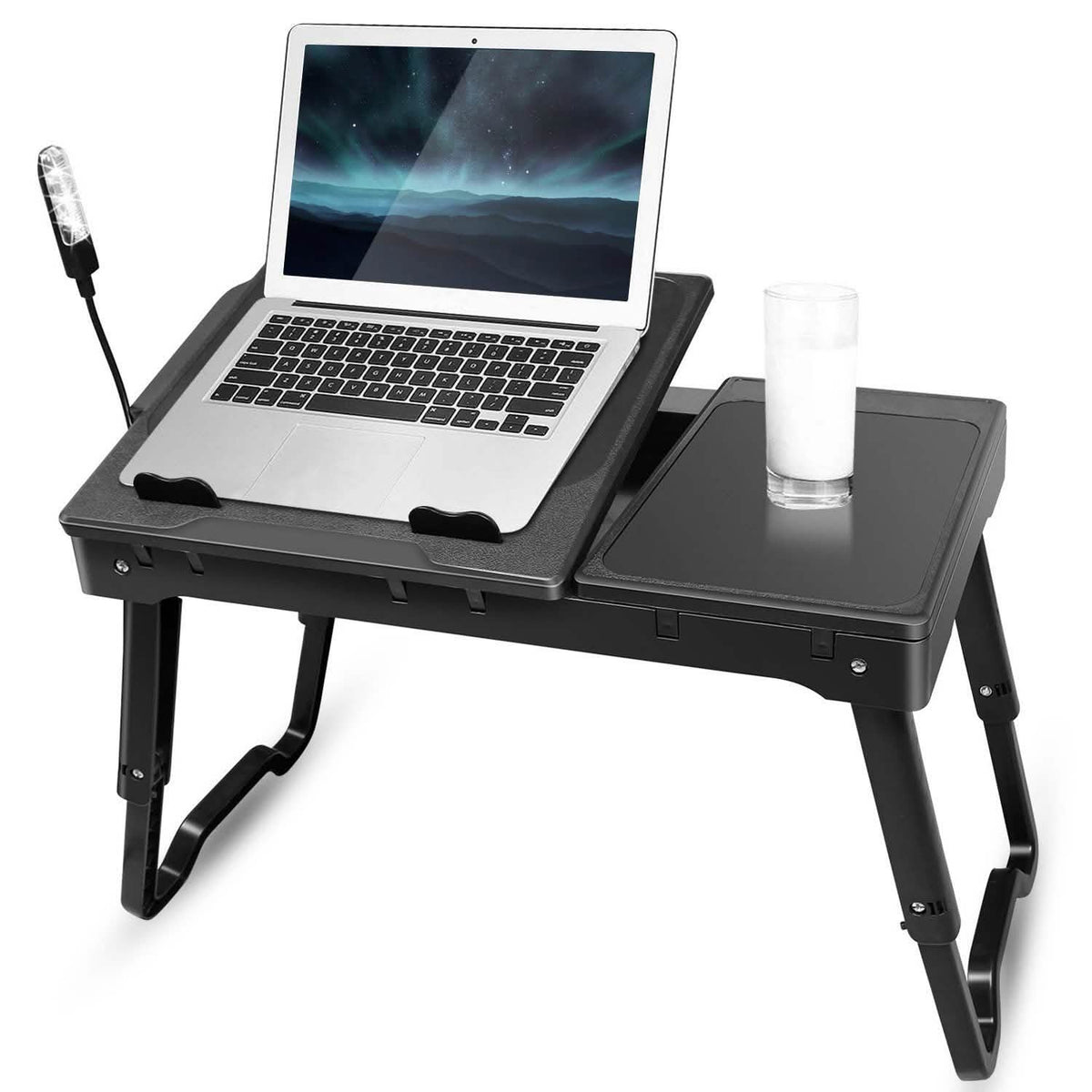 Foldable laptop desk with fan tray and side panel, supporting an open laptop