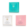 Boxed bath sponge set with teal, white, and pink flower-shaped sponges
