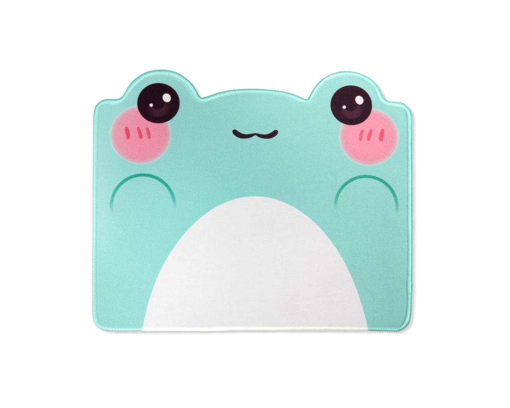 Teal frog-face desk mat with two pink cheeks, black eyes, and large white belly