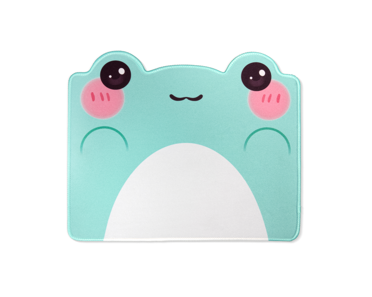 Teal frog-face desk mat with two pink cheeks, black eyes, and large white belly