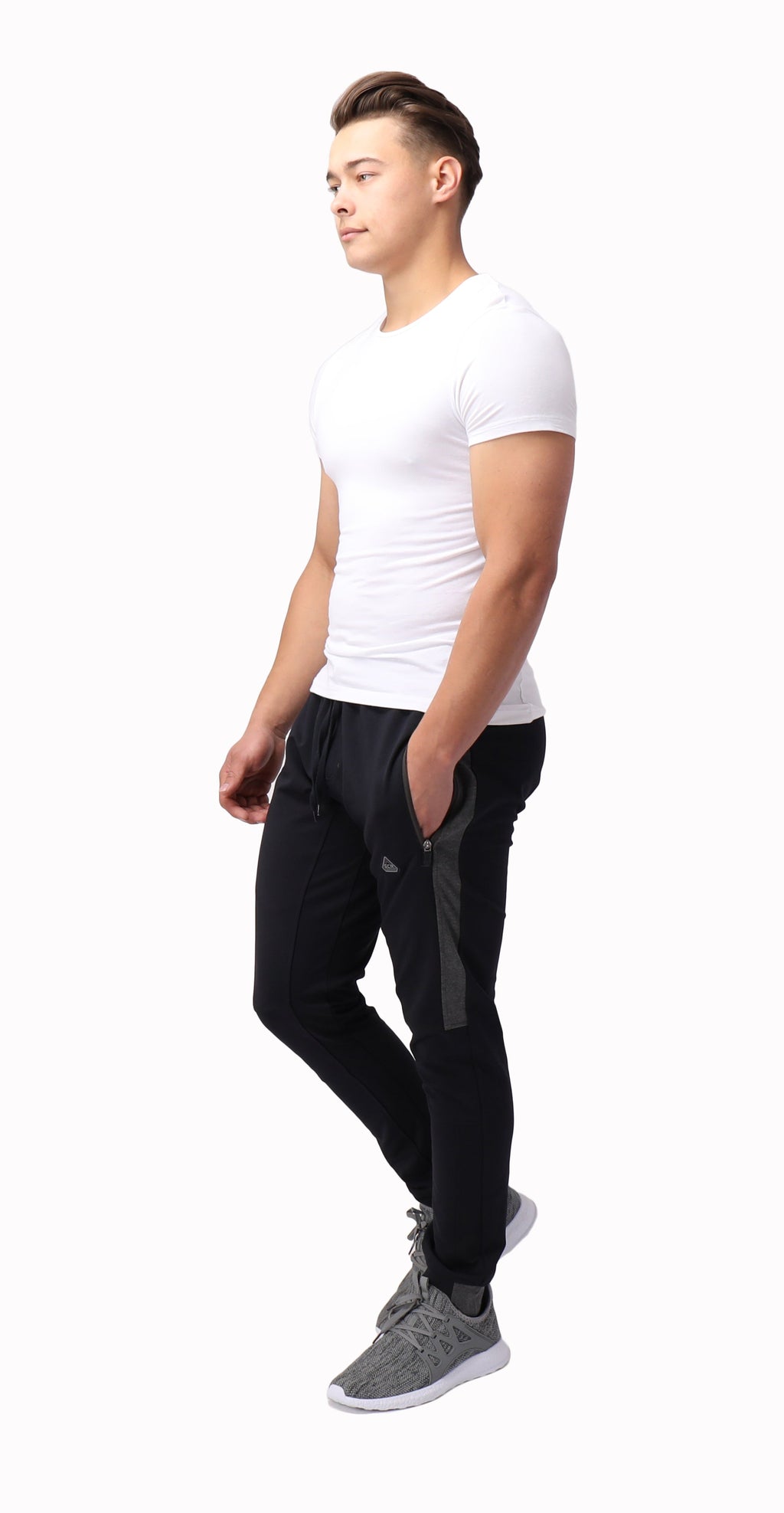 Tall fit jogger pants in dark color with drawstring waist, side stripe, and tapered fit