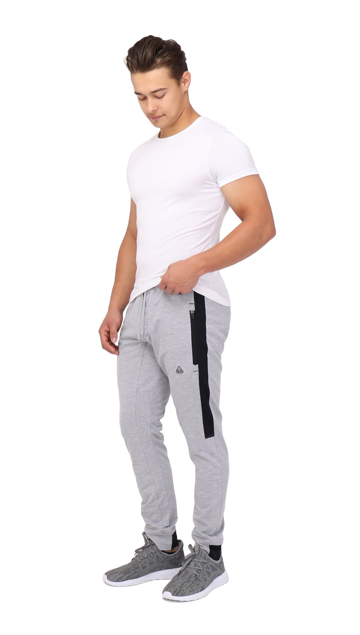 Tall fit jogger pants in light grey heather with black vertical stripe detail.