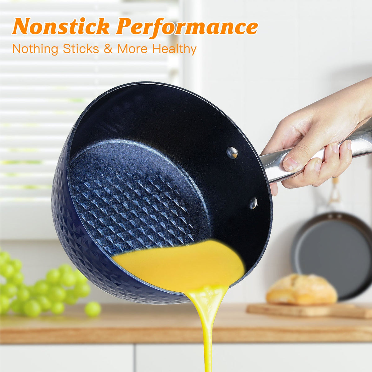 Blue nonstick frying pan with pouring spout, yellow oil in pan