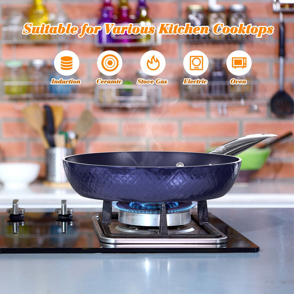 Blue nonstick frying pan on gas stove with visible burner flame