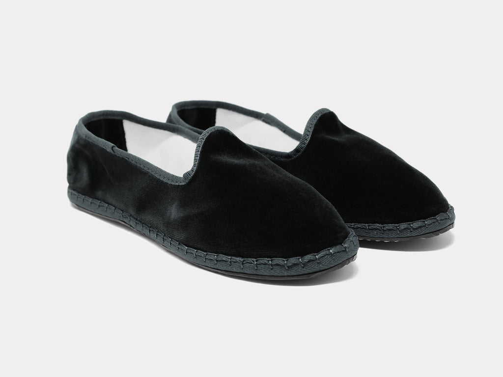 Furlane unisex black suede slip-on shoes with cushioned collar and textured sole.