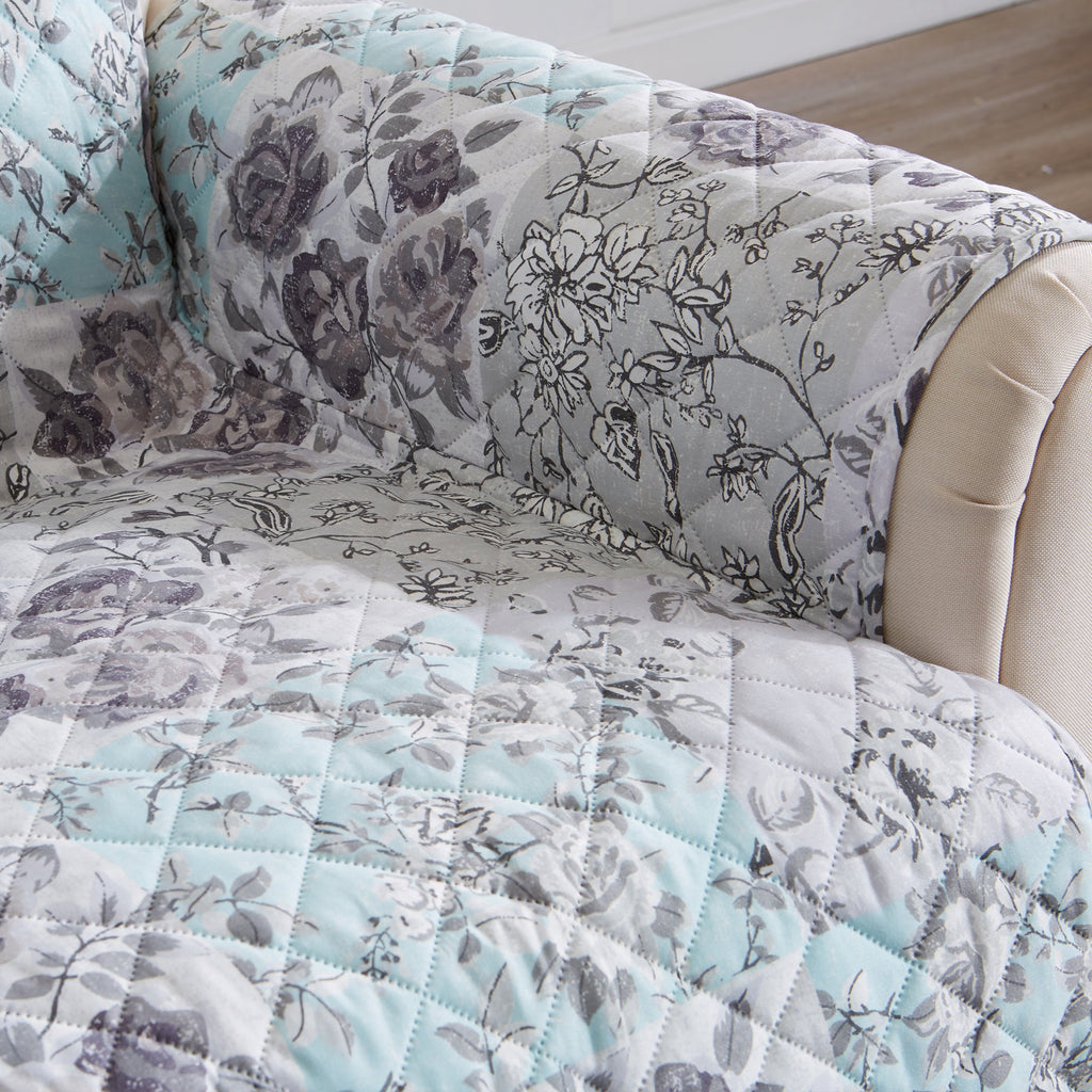 Reversible floral armchair protector, quilted light blue and gray with dark floral print