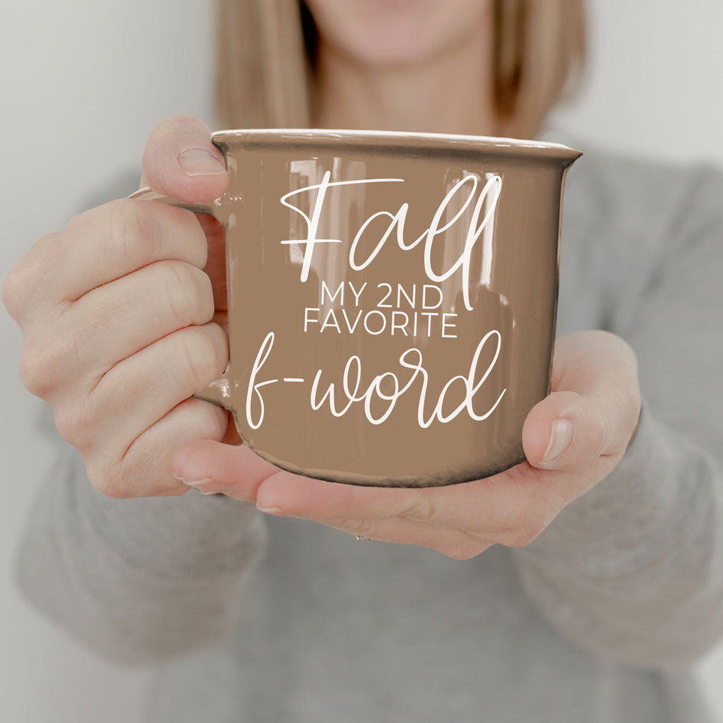 Taupe mug held in hands, front shows 'Fall my 2nd favorite f-word'