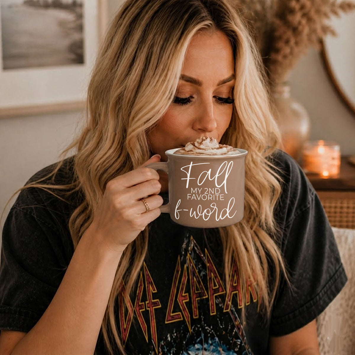 Woman sipping from taupe mug with 'Fall my 2nd favorite f-word' print