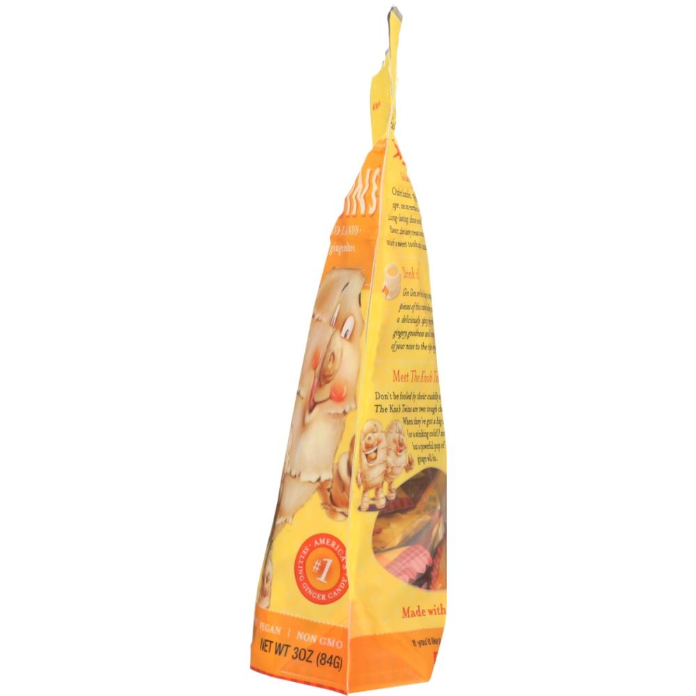 Hard ginger candy bag side view with cartoon ginger artwork and badge, orange