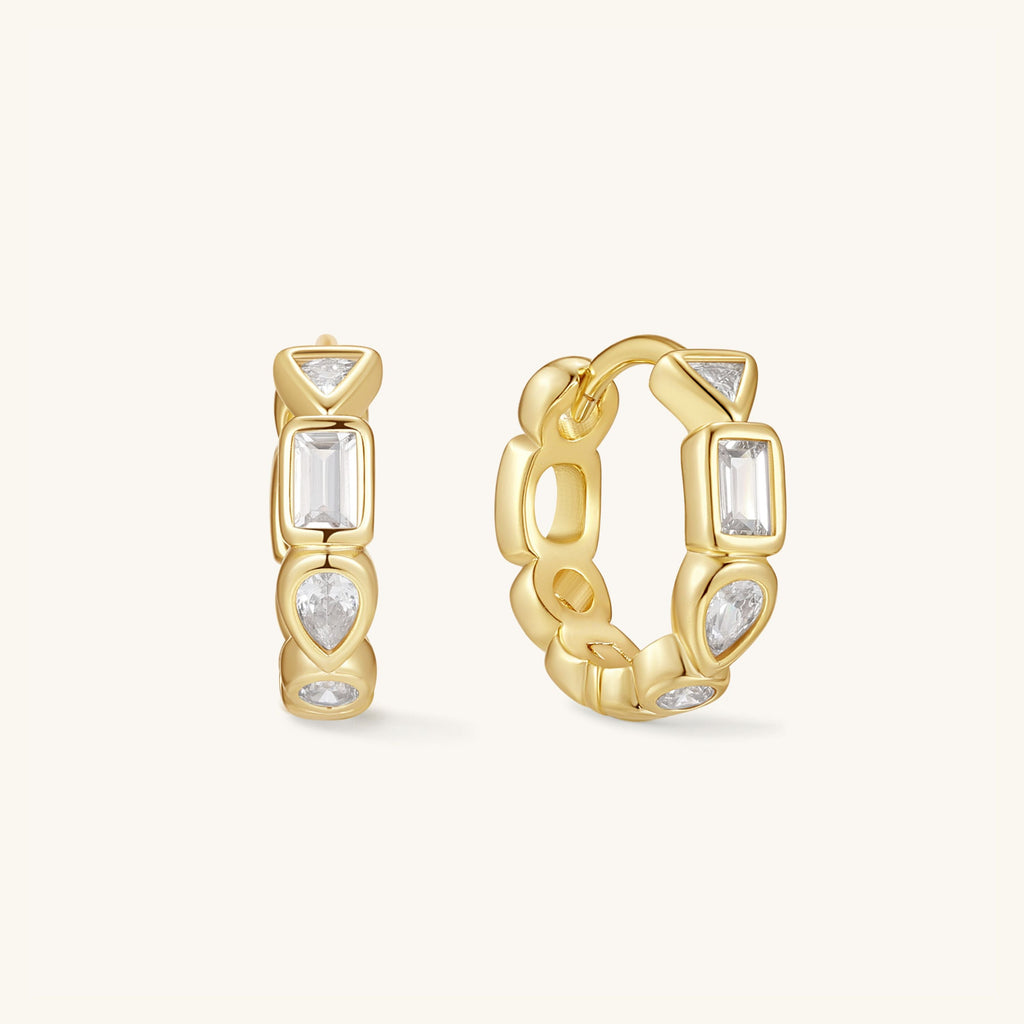 Gold gemstone hoop earrings with rectangular clear stones and circular drop details