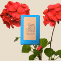 Geranium seed packet with red geranium flowers and green stems