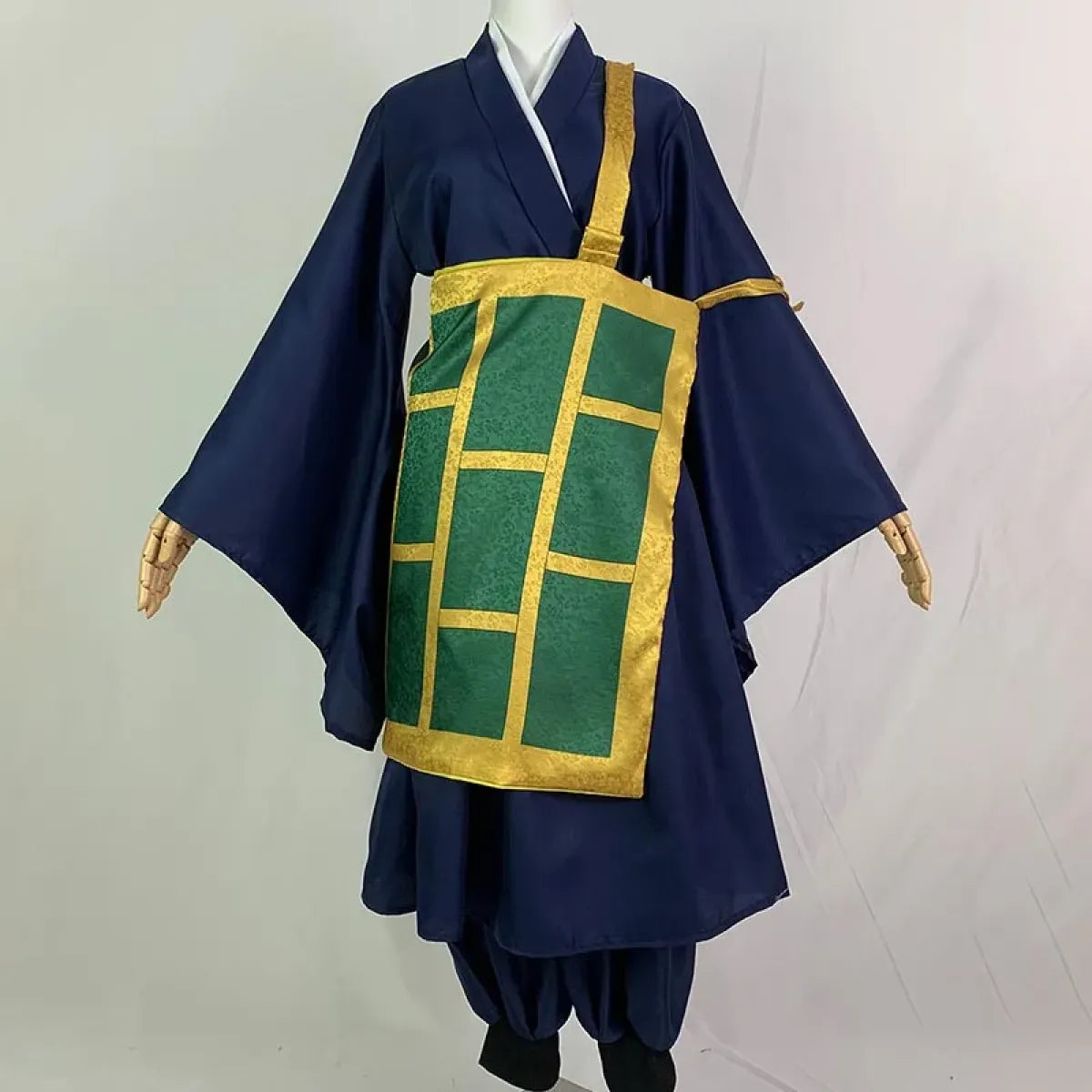 Navy kimono cosplay costume with white V collar, gold trim, green grid apron front