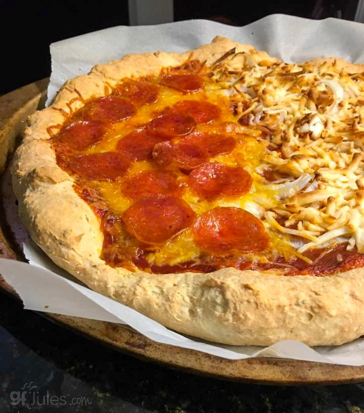 Gluten-free pizza crust mix, baked pizza with tomato sauce, melted cheese, shredded topping