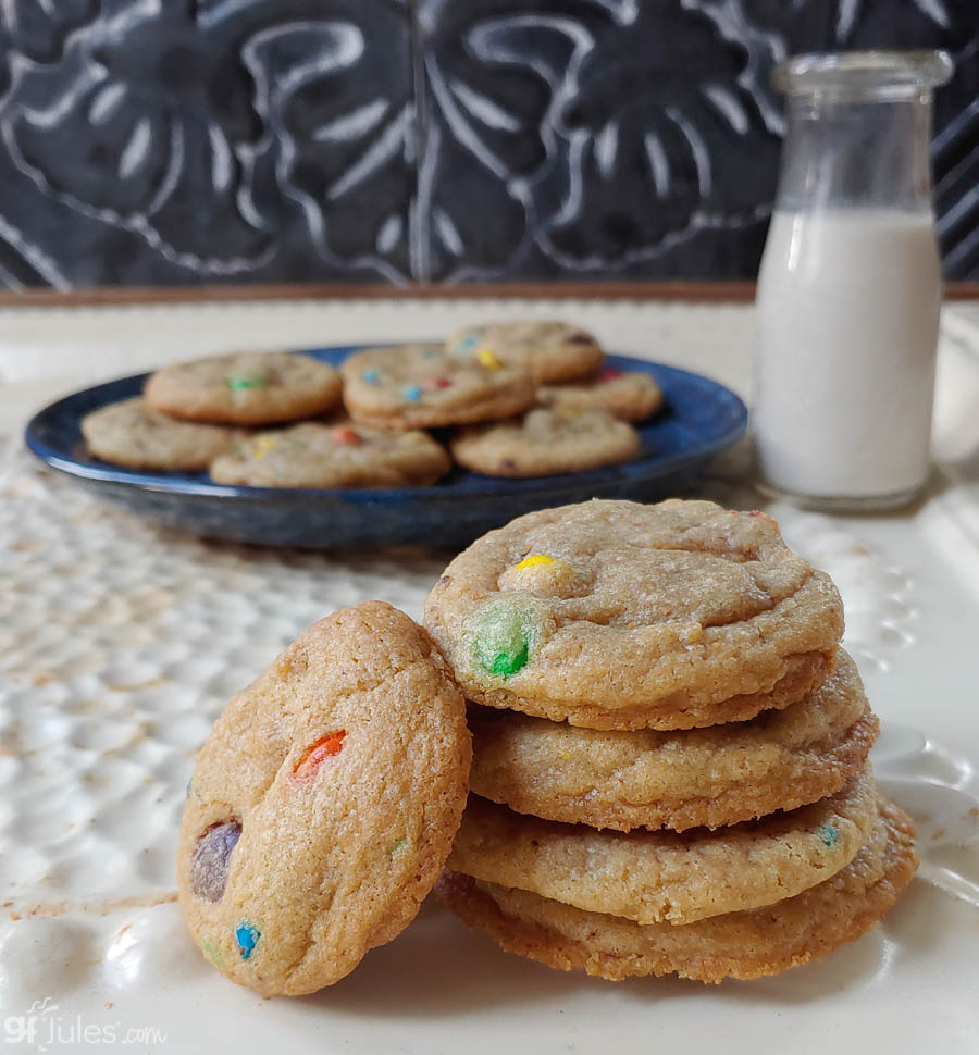 Stack of gluten free cookies with colorful chips on a plate
