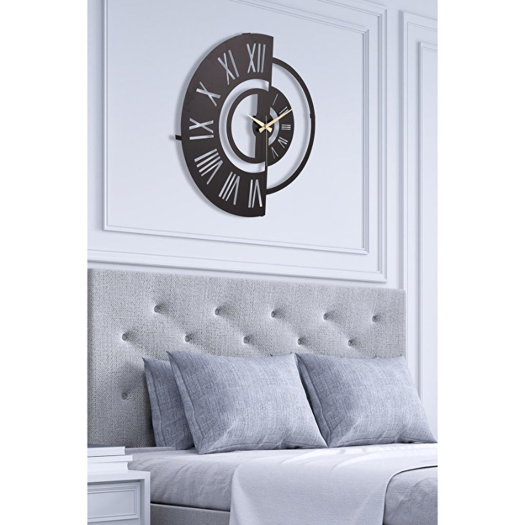 Black modern silent wall clock with Roman numerals and gold-tone hands, circular frame