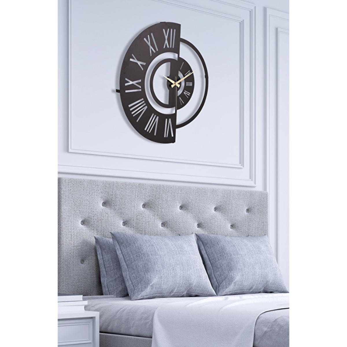 Black modern silent wall clock with Roman numerals and gold-tone hands, circular frame