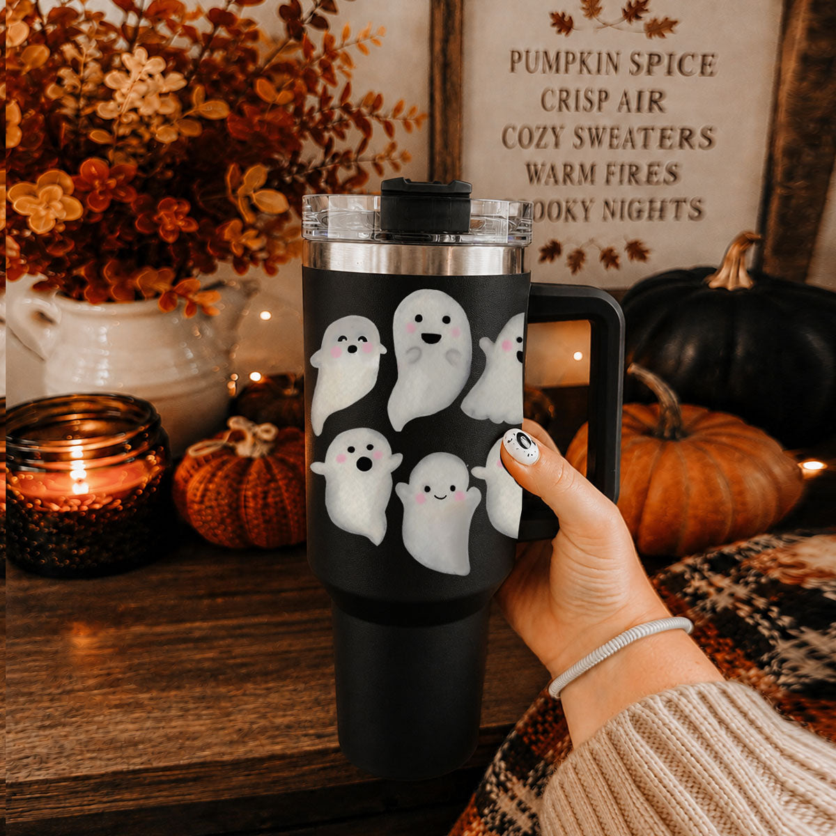 40oz ghost tumbler with clear lid and black handle, ghost faces on front