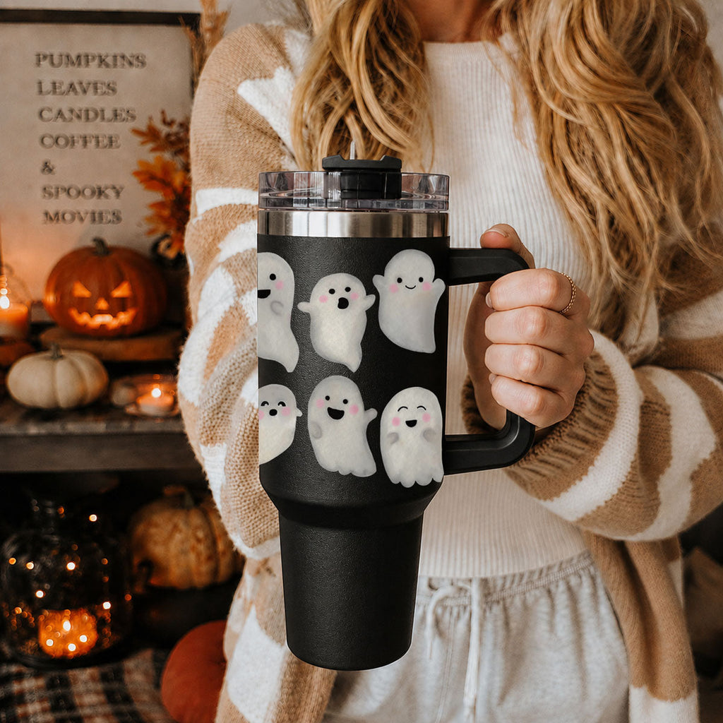 Woman holding 40oz ghost tumbler with clear lid and black side handle