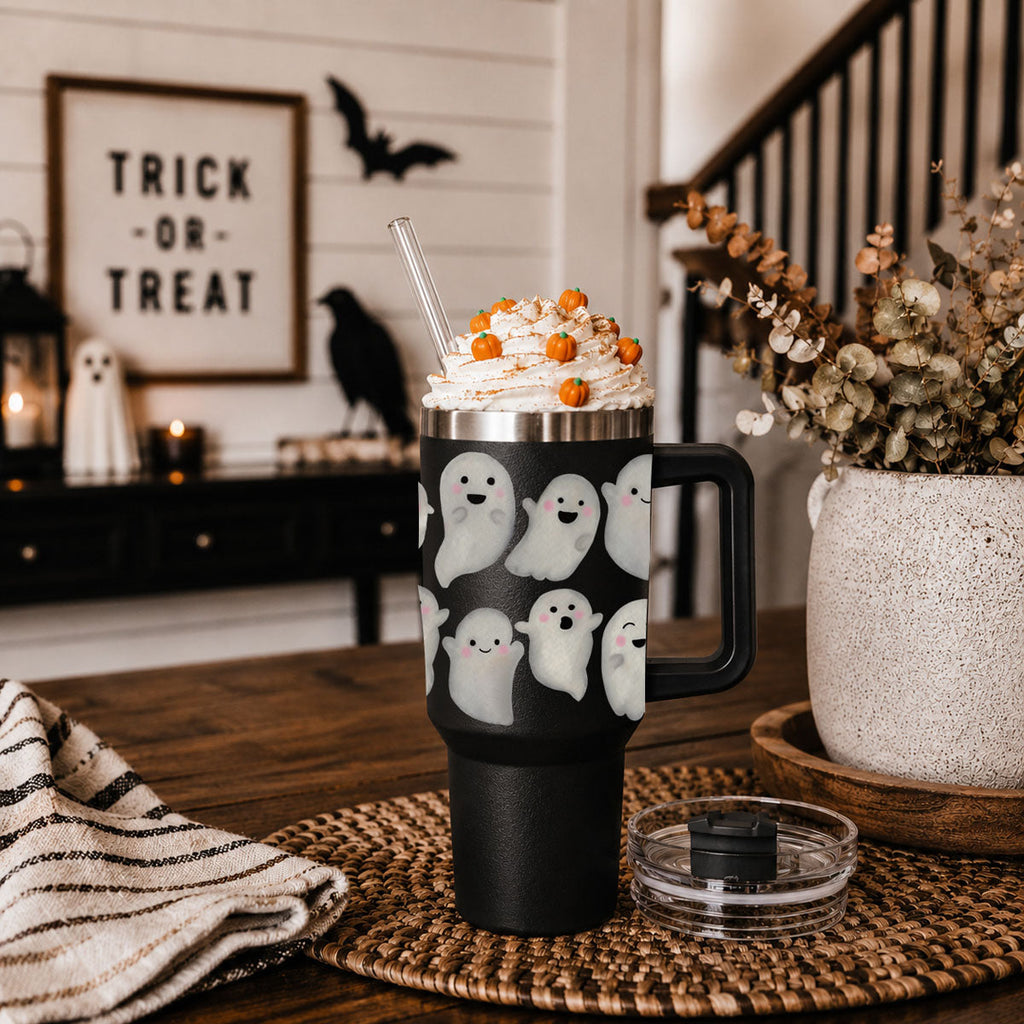 Black 40oz ghost tumbler with clear lid, side handle, and ghost graphics