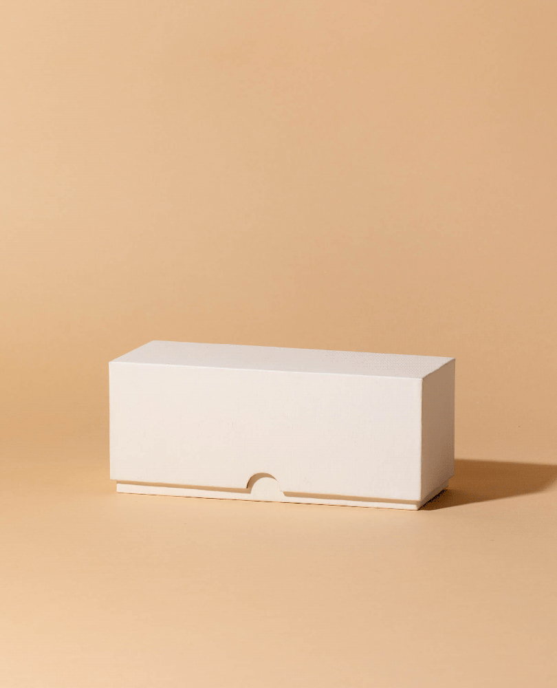 White linen candle box, closed with pull-tab cutout